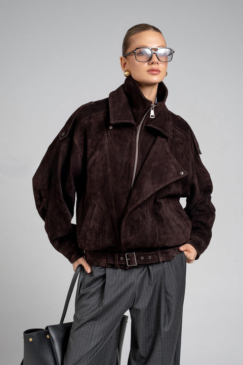 A suede jacket with a high neck and relaxed fit, combining sporty chic style with luxurious texture for effortless everyday elegance.