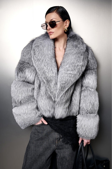 Chic model showcasing a Cropped Silver Fox Fur Coat with sunglasses and stylish accessories.